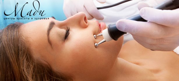 Лазерное фракционное омоложение области век, лица полностью, шеи и зоны декольте, удаление растяжек, рубцов и стрий в центре красоты «Мади». **Скидка до 88%**